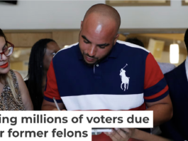 Javon Jackson, center, was able to register to vote following passage of a 2019 Nevada law that restored voting rights to formerly incarcerated individuals. AP Photo/John Locher